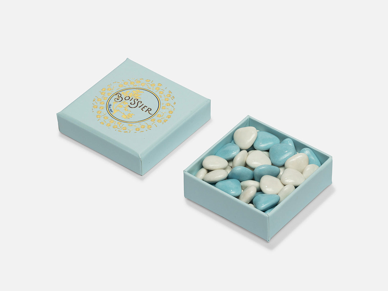 Dragées au chocolat en forme de cœur bleues et blanches dans boîte bijoux de 50g