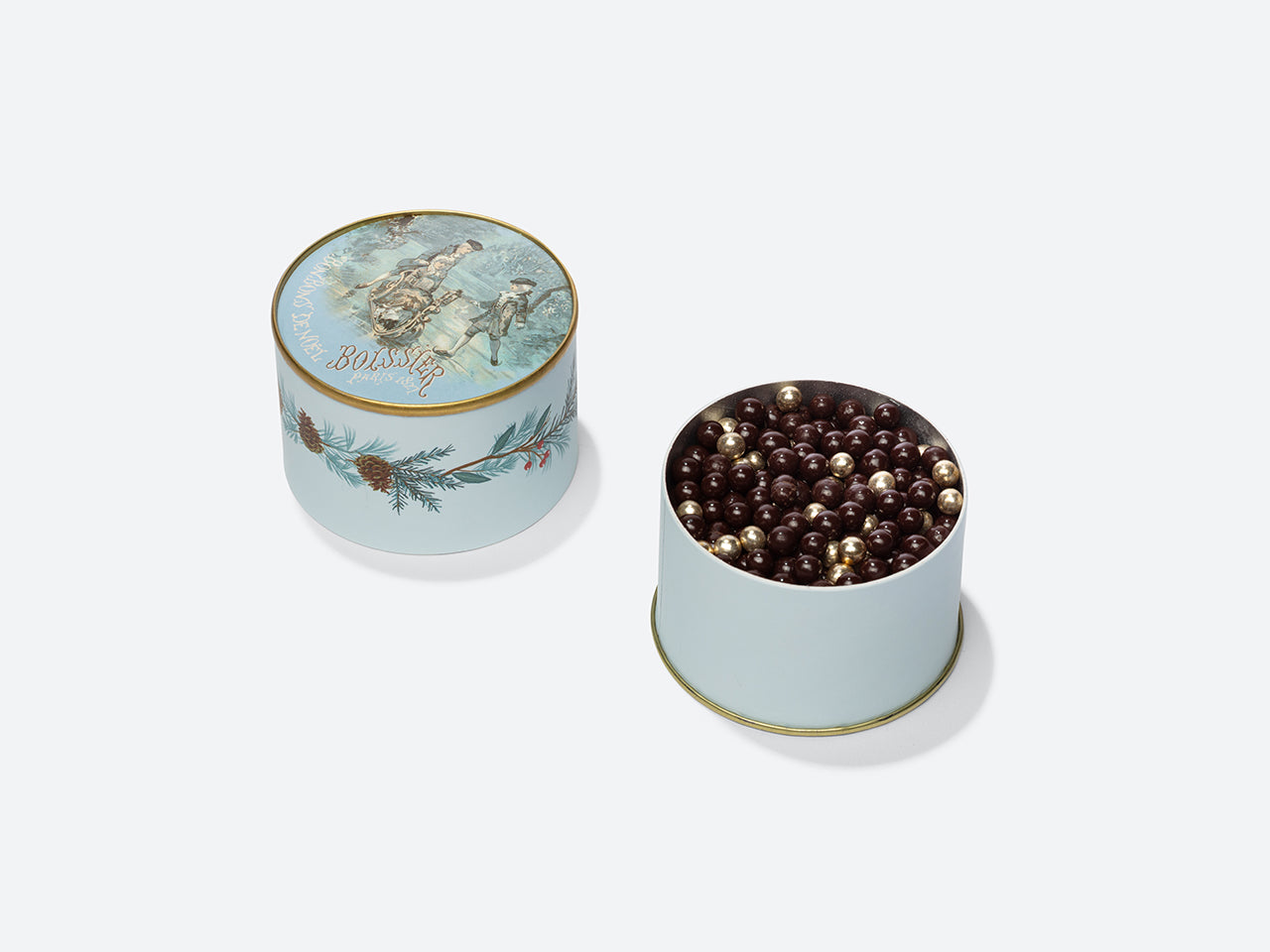 Perles de chocolat et perles dorées dans poudrier Patineurs