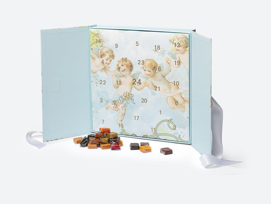 Calendrier de l'Avent avec motif Anges ouvert et assortiment de caramels
