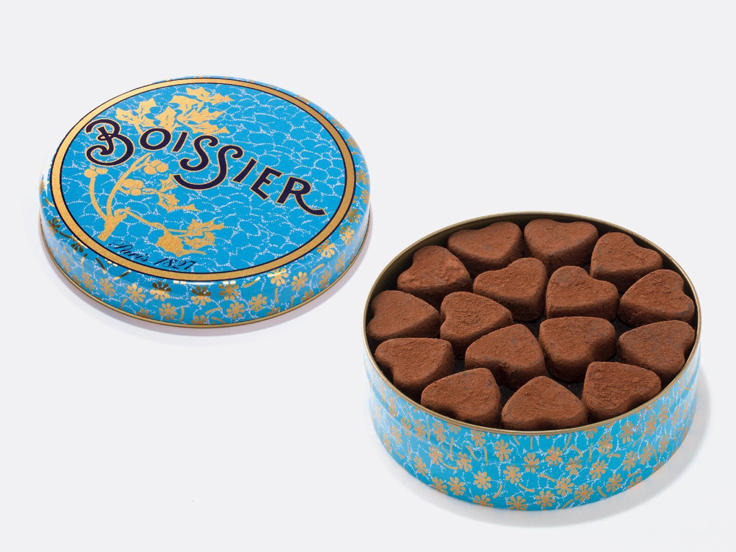
                  
                    Boîte métal bleue de 48 truffes au chocolat en forme de coeur
                  
                