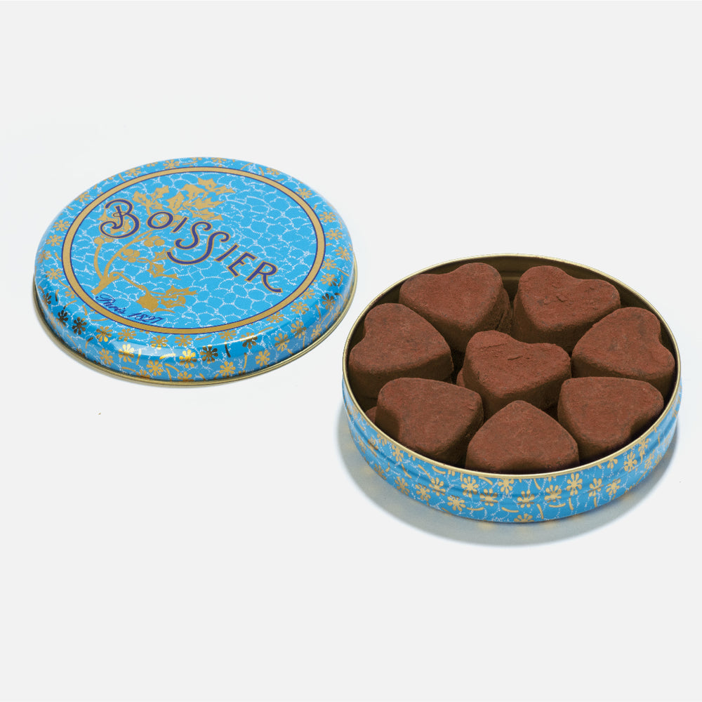 
                  
                    Boîte métal bleue de 16 truffes au chocolat en forme de coeur
                  
                